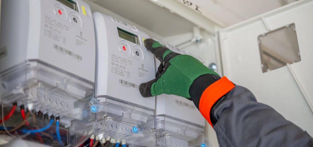 Technician checking a smart electricity meter.